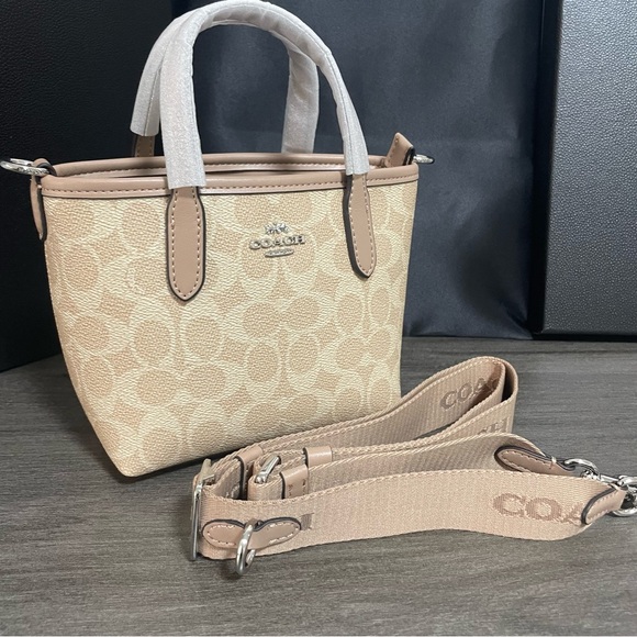 Coach Handbags - Coach Tan Signature Mini Bag